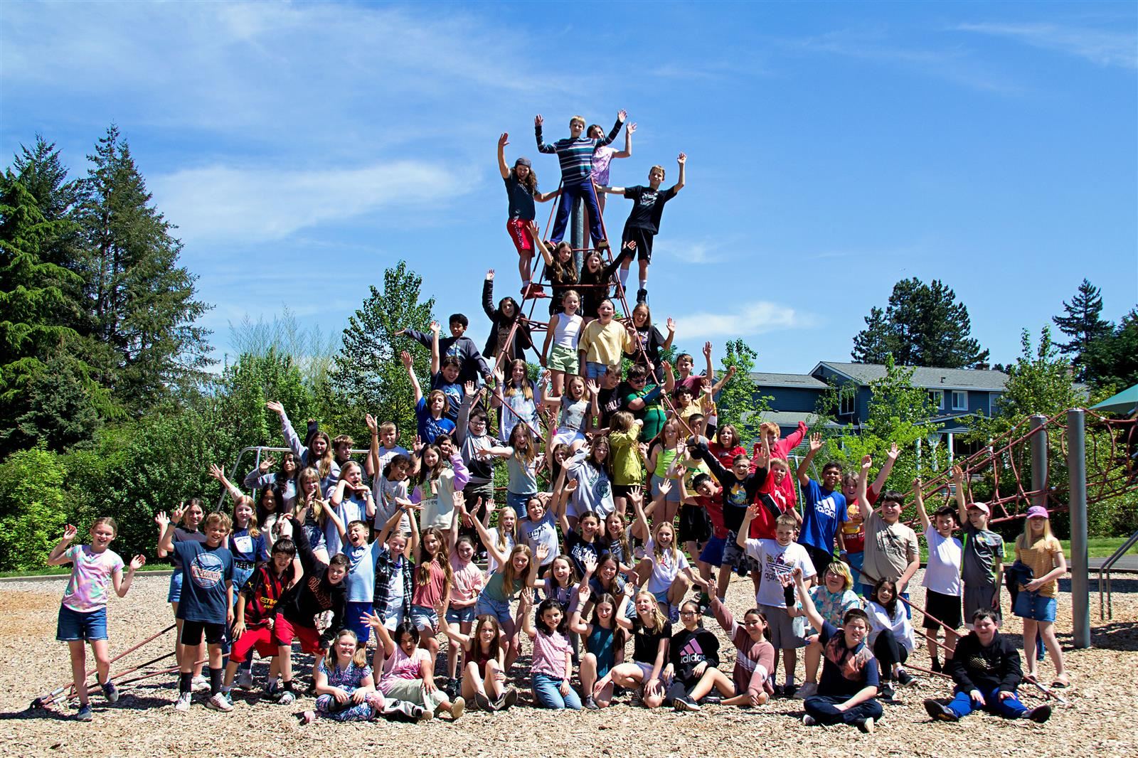 Students take a picture on the playground. Students take a picture on the playground.