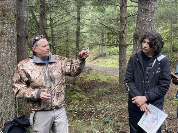 Forest Management Students receive a tour from a OSU Extension Forester at Hopkins Demonstration Forest.